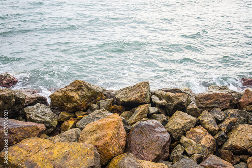 Photography Sea waves and rock dams prevent erosion