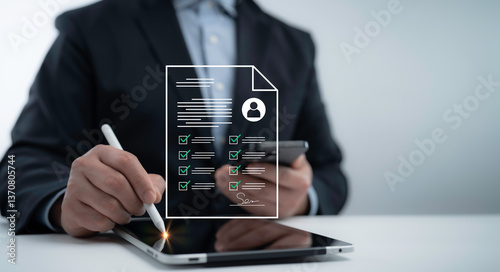 Businessman signing a digital document on a tablet, representing online contract approval, electronic signatures, and business document verification