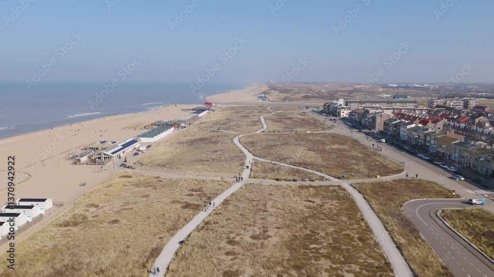 Aerial drone video of the coastal town and beach of Katwijk in the Netherlands.