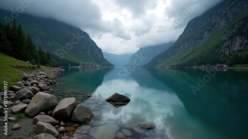 Misty Lake Cauma at dawn with raindrops rippling the water, surrounded by dense Swiss forests. Soft light reflects on the wet landscape, creating a tranquil, moody scene.