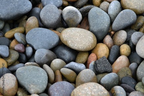 Textured background weathered stones on the beach