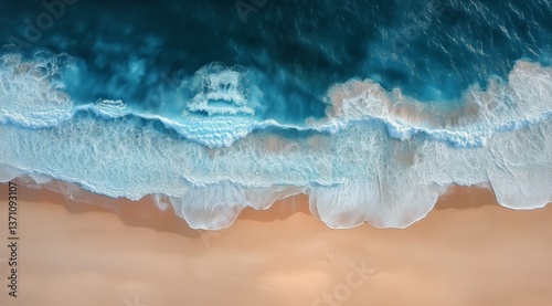 Waves Gently Crashing on a Sandy Shore During Daylight Hours at a Coastal Loc...