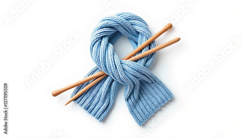 Cozy knitted scarf with wooden needles on white background, warmth