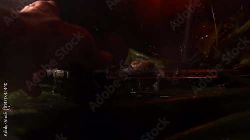 Wallpaper Mural Slow  motion 4k jungle miltary scene knife and hand grenage with camera dolly movement and rain - hand come in in the shot and pick ups hand grendae in the rain Torontodigital.ca