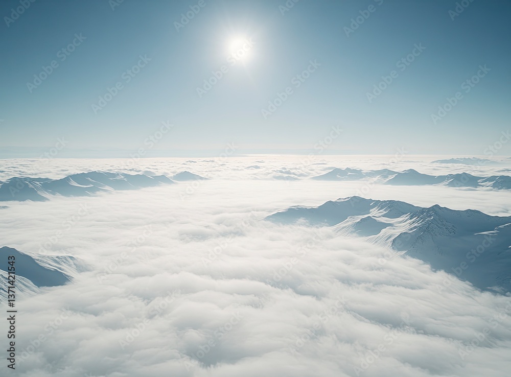 Naklejka premium The top of the snow mountain, overlooking clouds and fog below, covered with deep white powder on both side