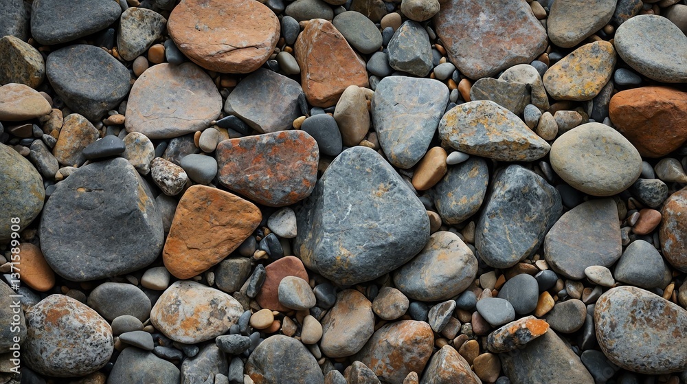 A visually appealing collection of smooth pebbles, showcasing a variety of colors and textures found in nature, perfect for backgrounds or minimalistic designs.