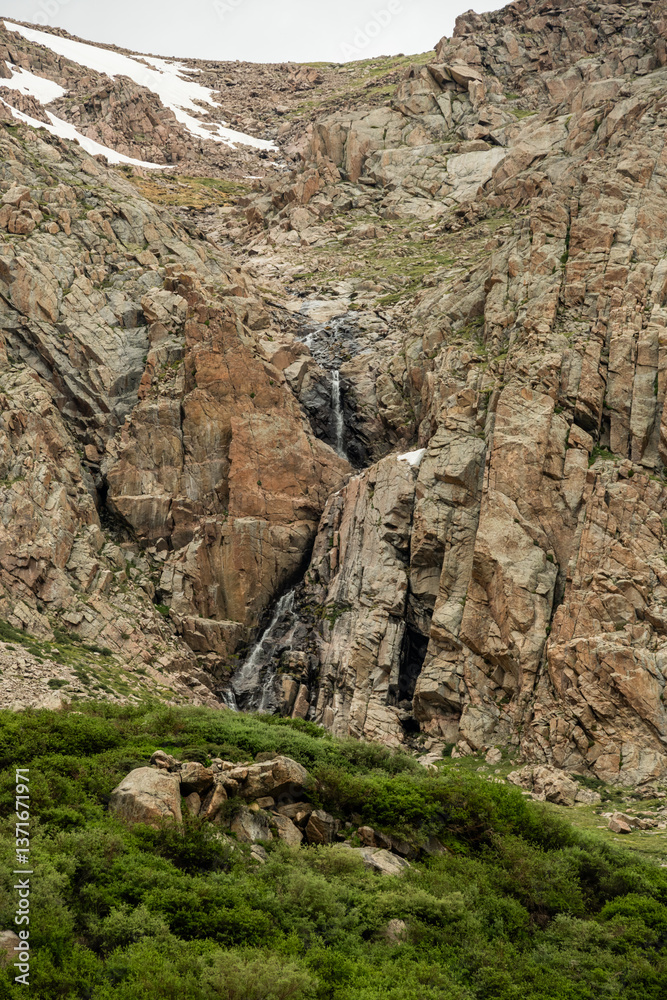 Waterfall Tumbles Over Cliff Walls into Crystal Lakes