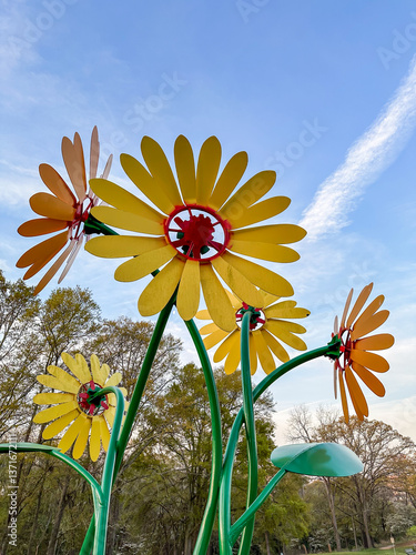 Obraz na płótnie Whimsical Flower Shapes in Public Park w salonie