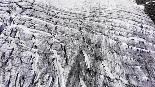 Beautiful drawing of a large glacier view from above. Aerial shot of natural texture in motion. 