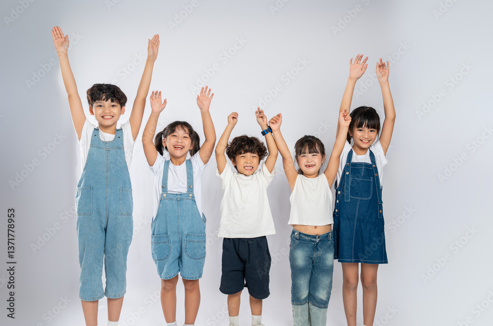 Fototapeta premium group image of cute asian kids posing on white background