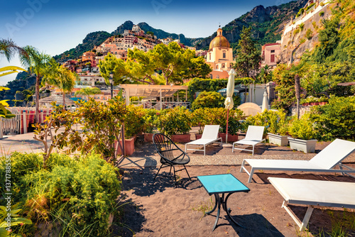Obraz na płótnie Superb summer scene of sunny yard in cliffside village on southern Italy's Amalfi Coast - Positano. Sunny morning view of Mediterranean sea resort. Vacation concept background. w salonie