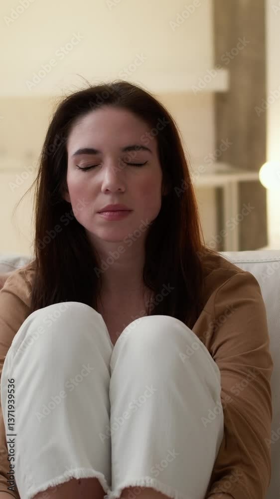 Tired brunette woman does not react to her daughter because she is tired Tired brunette woman does not react to her daughter because she is tired