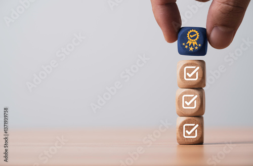 Hand putting the best quality assurance with golden five stars on correct sign mark for guarantee product and ISO service concept.