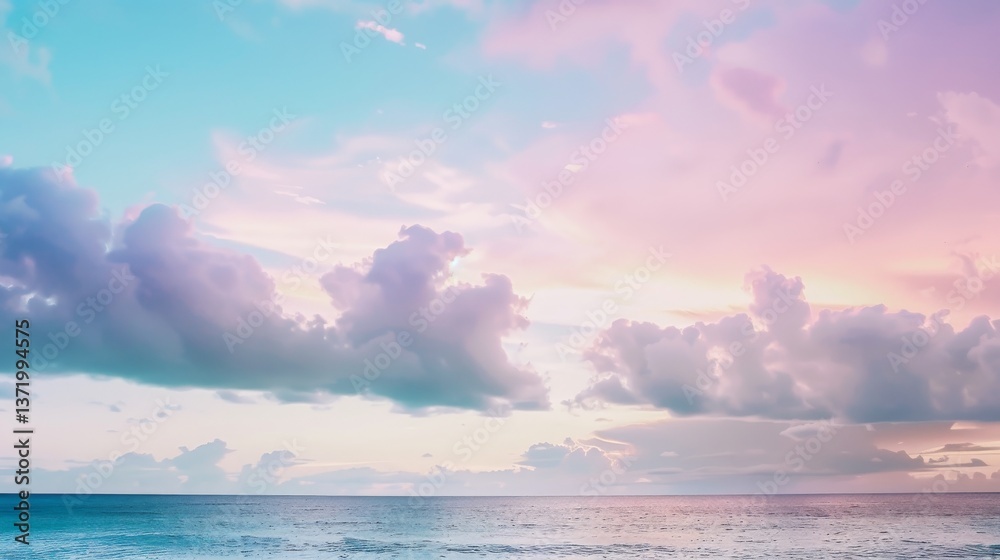 Obraz premium Colorful cloudscape over a calm sea at sunset