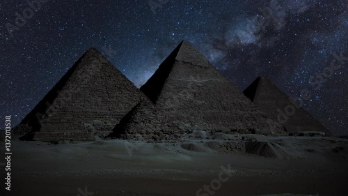 Egypt Great Pyramid of Giza and Milky Way Galaxy in the Night Sky. Timelapse of Pyramid complex of Giza at night. Giza, Cairo, Egypt. The Great Pyramids of Giza, Time Lapse at night. Unesco World Site