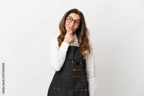 Restaurant middle aged waiter woman isolated on white background with glasses and smiling