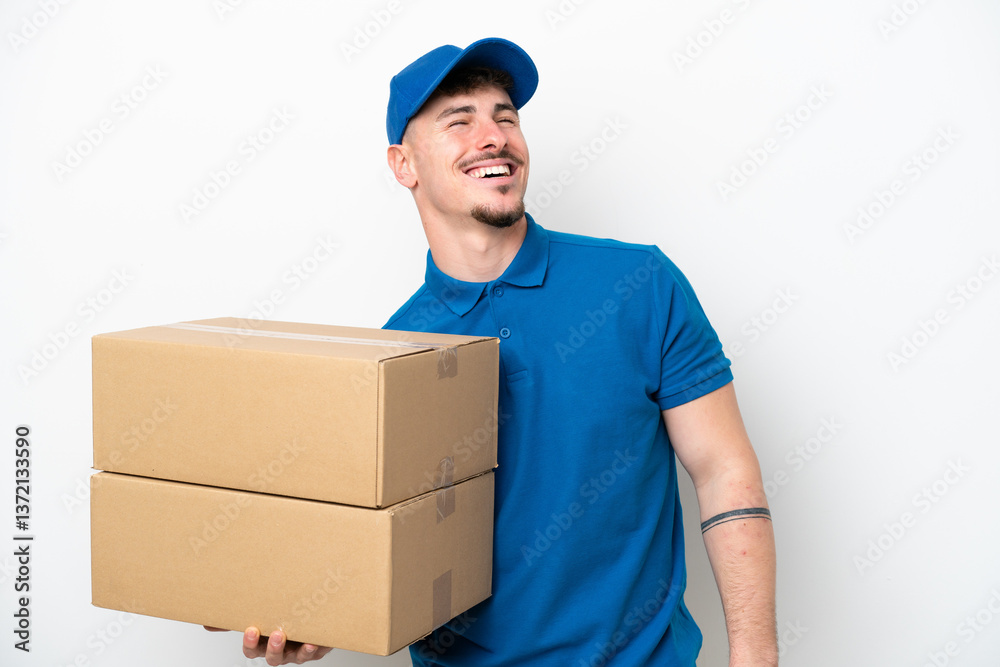 Delivery caucasian man isolated on white background laughing Delivery caucasian man isolated on white background laughing