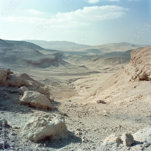 Desert mountains with canyons and craters.