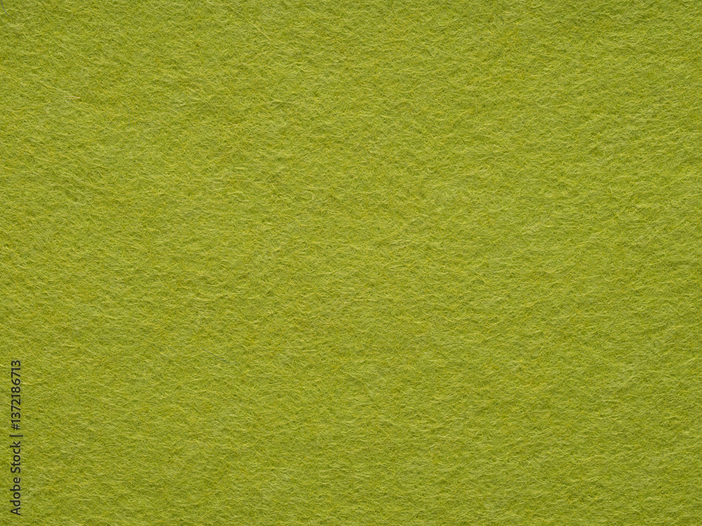 A close-up perspective enhances the vibrant verdancy of the felt, evoking a tranquil, textured solace