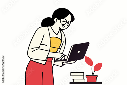 Business woman working on a laptop in an office environment