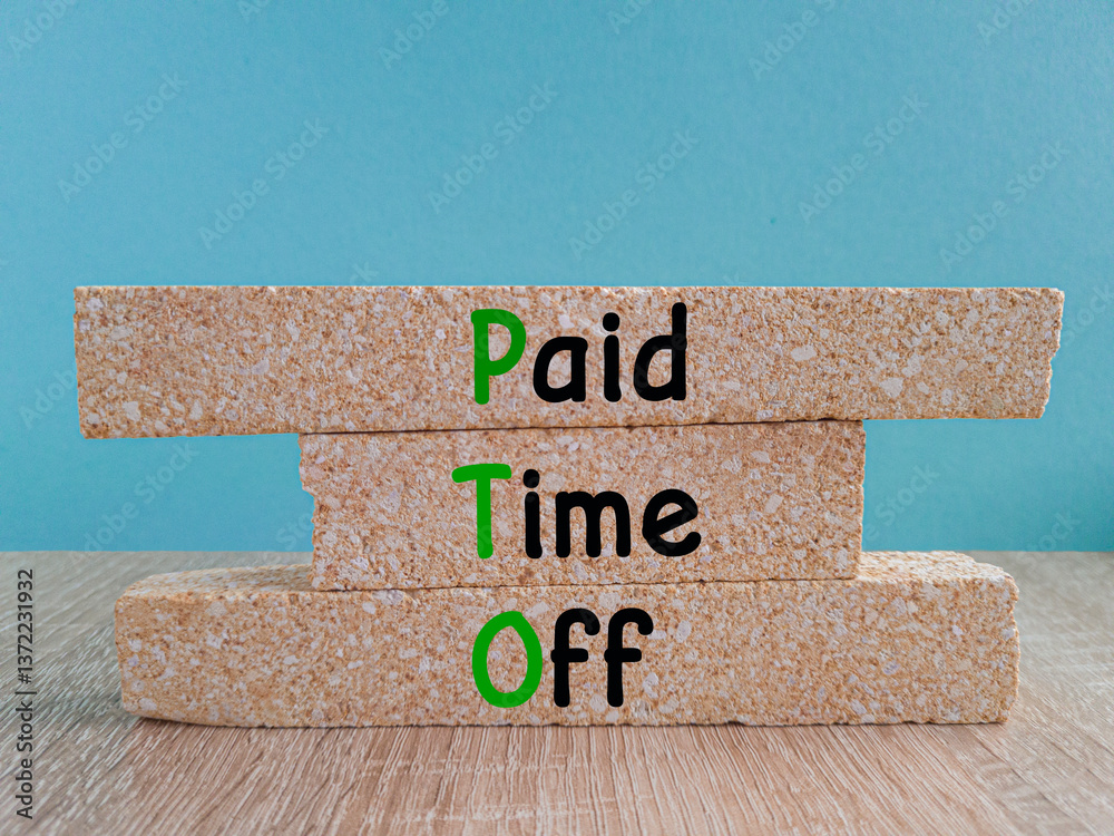 Paid time off symbol. Brick blocks with words Paid time off on beautiful blue background wooden table. Business and paid time off concept.