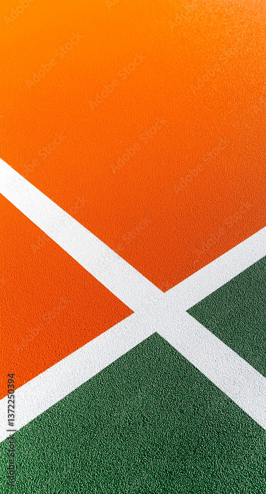 A tennis court with a white line and a green line