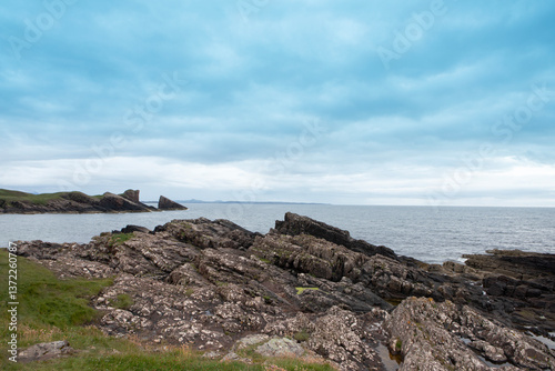 The rocky shores close to Clachtoll beach in Scotland. photo