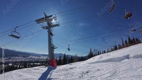 Cable car at the ski resort in Sheregesh. Active winter recreation in nature.
