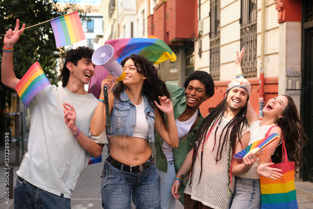 Happy multiethnic activists protesting for lgbt rights and holding rainbow flags in the city