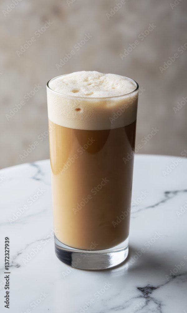 Frosty Iced Latte on Marble Table Frosty Iced Latte on Marble Table