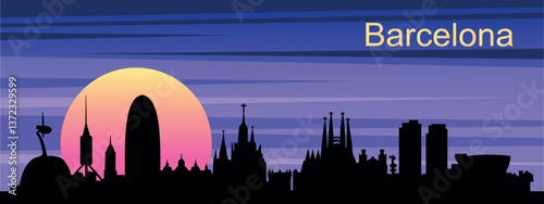 Silhouette of the evening skyline of Barcelona against the sunset