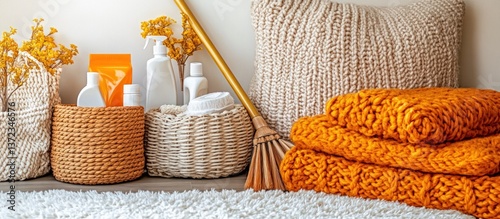 Obraz na płótnie Home Organization with Wicker Baskets, Knitted Throws, and Cleaning Supplies w salonie