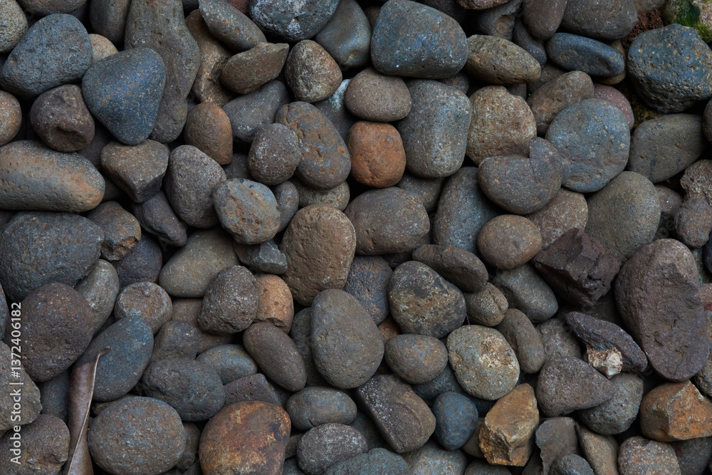 Close up Texture of Diverse River Stones Highlighting Natural Colors and Shapes in a Serene Outdoor Setting Close up Texture of Diverse River Stones Highlighting Natural Colors and Shapes in a Serene Outdoor Setting
