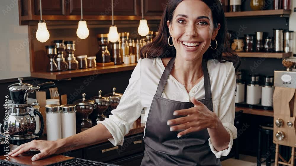 Happy female barista making coffee with espresso machine in cozy cafe