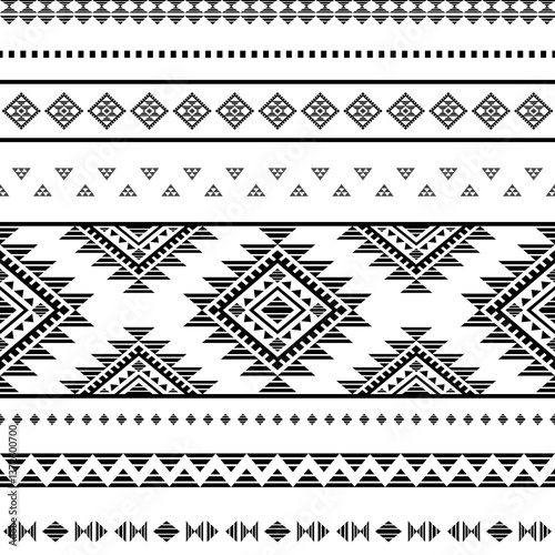 Ancient echoes Aztec geometric seamless pattern southwest Navajo Native American tribal ethnic black and white for textile printing