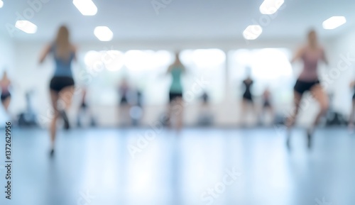Gym interior Blurred background with equipment for fitness and sports