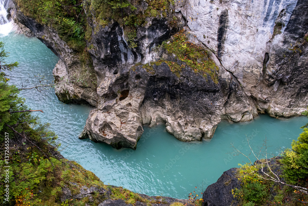 Fototapeta premium Turquoise river Lech flowing through rocky gorge near Füssen, Bavaria, Germany.