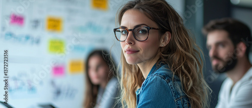 Confident Businesswoman In Modern Office Brainstorming Session