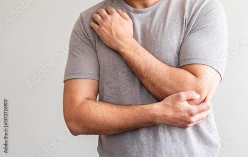 Feeling pain and stiffness of elbow joints caused
