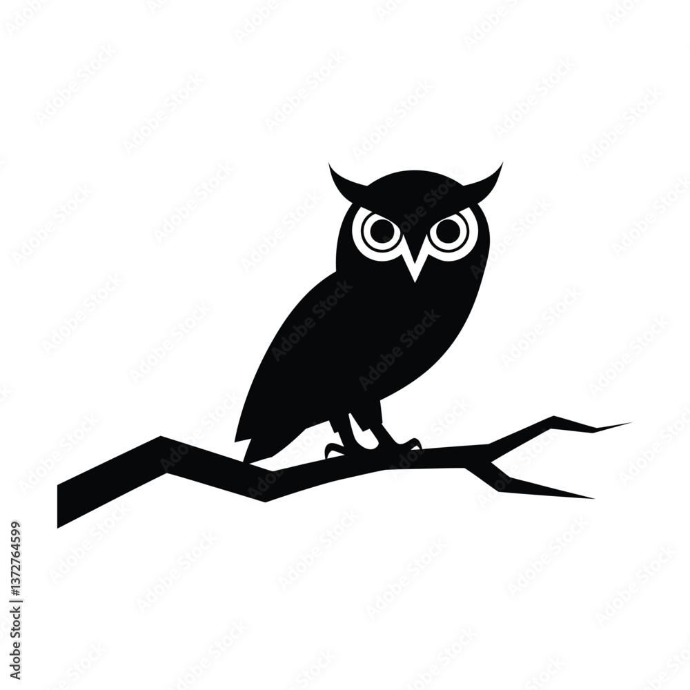 Owl silhouette perched on a branch