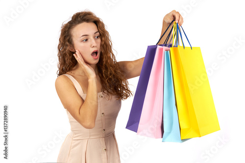 Girl with bags and purchases in a store.
