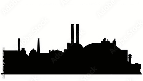 Industrial skyline at dusk showcasing silhouettes of factories and smokestacks against a gradient sky