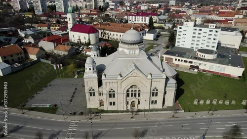 Old renovated Jewish synagogue, religious building, drone footage, Lučenec, Slovakia.