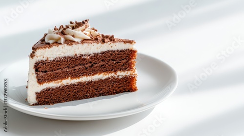 Wallpaper Mural A tempting slice of chocolate cake topped with shavings and cream, sitting on a white plate, capturing the allure of a rich, chocolatey dessert perfect for celebrations. Torontodigital.ca