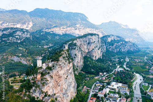 Arco Castle ruined castle located on a prominent spur high above Arco and the Sarca Valley in Trentino. Aerial view