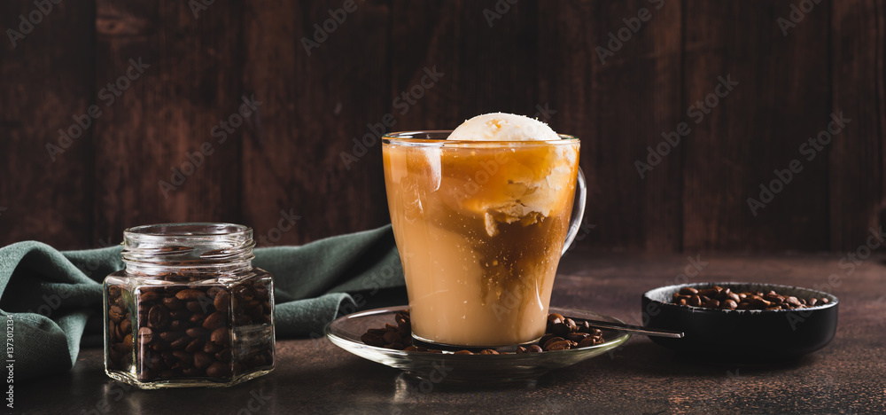 Delicious sweet affogato coffee with creamy ice cream in a cup on the table web banner