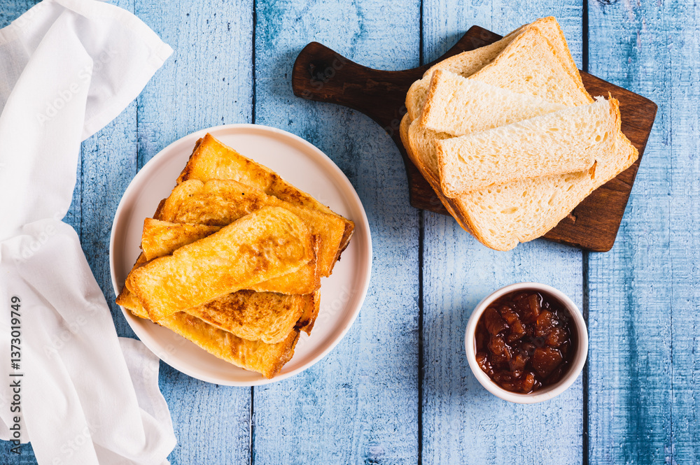 French crispy sweet toast on plate on table top view