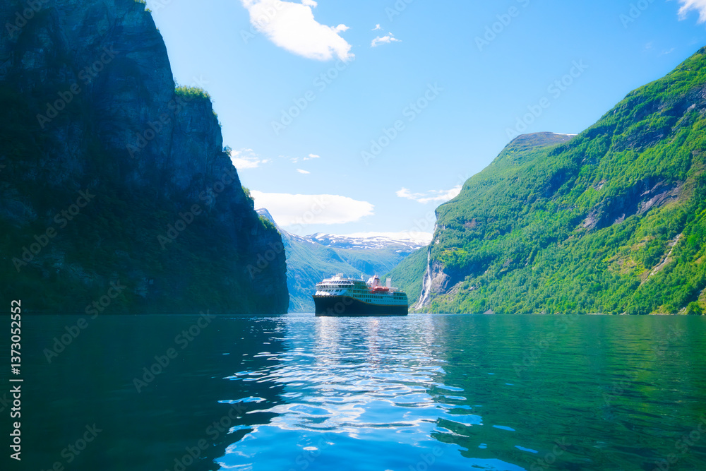Cruise ship in the fjord. Geiranger Fjord, Norway. Traveling on a Norwegian fjord. Scandinavia. Vacation and travel in summer Norway. Background, wallpaper, postcards.
