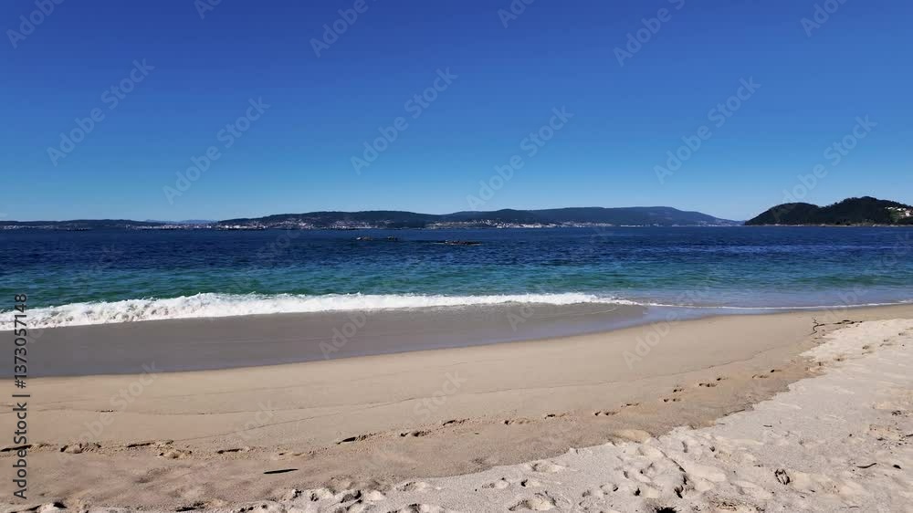 Serene Beach with Tranquil Clear Waters and Sand in Bueu Serene Beach with Tranquil Clear Waters and Sand in Bueu