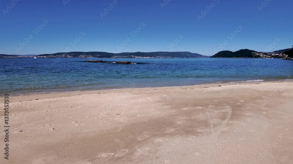 Serene Beach with Tranquil Clear Waters and Sand in Bueu Serene Beach with Tranquil Clear Waters and Sand in Bueu